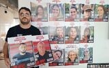 Bashir Ziyadne, 28 ans, au Forum des otages et des proches de disparus, avec devant lui la photo de son cousin germain Youssef Ziyadne et du fils de ce dernier, Hamza, pris en otage par le Hamas, le 27 juin 2024. (Crédit : Gianluca Pacchiani/Times of Israel)