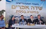 La ministre des Implantations et Missions nationales, Orit Strouk (2e à partir de la gauche), le ministre de l'Énergie, Eli Cohen (au centre), le ministre du Logement et de la Construction, Yitzhak Goldknopf (2e à partir de la droite), le député du Likud, Boaz Bismuth (à droite) et le président du Conseil de Yesha, Israel Ganz (à gauche), lors d'une cérémonie d'inauguration de l'avant-poste illégal de Sde Ephraïm, en Cisjordanie, que le cabinet a légalisé rétroactivement en juin 2024. (Crédit : Bureau des Implantations et Missions nationales, ministre Orit Strouk)