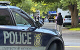 Une voiture de police de l'Université du Michigan sur le campus d'Ann Arbor, le 21 mai 2024. Illustration (Crédit : Mike Householder/AP)