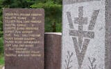 Un monument commémore les "maquisards" (membres de la résistance française) fusillés par les soldats allemands pendant la Seconde Guerre mondiale en 1944, à Moyenmoutier le 30 septembre 2024. (Crédit : Jean-Christophe VERHAEGEN / AFP)