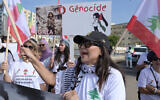 Des manifestants rassemblés lors d'une marche appelant à la paix et à la justice pour le Liban et Gaza, devant la Porte du Millénaire, à Dakar, au Senegal,  le 19 octobre 2024 . (Crédit : Seyllou/AFP)