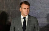 Le président français Emmanuel Macron écoutant une conférence de presse, à Paphos, Chypre, le  11 octobre 2024. (Crédit : Petros Karadjias/AP)