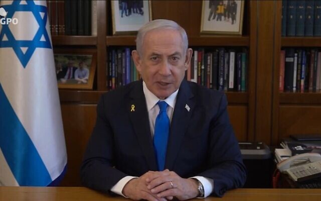 Le Premier ministre Benjamin Netanyahu s'exprime dans un message vidéo depuis son bureau, le 8 octobre 2024. (Crédit : Capture d'écran/GPO) Le Premier ministre Benjamin Netanyahu s'exprime dans un message vidéo depuis son bureau, le 8 octobre 2024. (Crédit : Capture d'écran/GPO)