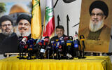 Le porte-parole en chef du Hezbollah, Mohammed Afif, s'exprimant lors d'une conférence de presse, à Dahiyeh, dans la banlieue sud de Beyrouth, au Liban, le 11 novembre 2024. (Crédit : Hussein Malla/AP)