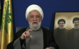 Le chef du Hezbollah, Naïm Qassem, prononçant un discours télévisé depuis un lieu non divulgué, sur une capture d’écran prise le 20 novembre 2024. (Crédit : Al-Manar/AFP)