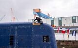 Le nom de l'INS Drakon de la marine israélienne annoncé au chantier naval de Kiel, en Allemagne, le 12 novembre 2024. (Crédit : Armée israélienne)