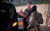 Un Israélien soupçonné d'espionnage pour le compte de l'Iran  arrêté, sur une photo publiée le 9 décembre 2024. (Crédit : Police israélienne)