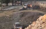 Véhicules incendiés par des résidents d’implantations lors d'une attaque contre le village palestinien de Silwad, le 3 janvier 2025. (Crédit : Yesh Din)