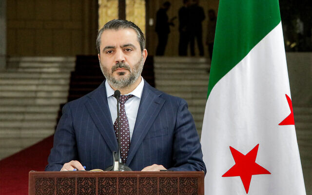 Asaad al-Chibani, ministre des Affaires étrangères du gouvernement intérimaire syrien, donne une conférence de presse conjointe avec le ministre ukrainien des Affaires étrangères à Damas, le 30 décembre 2024. (Crédit : Bakr ALKASEM / AFP) Shibani (Shaybani), ministre des Affaires étrangères for the interim Syrian government, gives a joint press conference with Ukraine's Foreign Minister in Damascus on December 30, 2024. - Ukraine's Foreign Minister on December 30 urged the new Syrian leader to expel Russia from the country during an unannounced visit to Damascus. Moscow was one of former president Bashar al-Assad's key backers, intervening to help to turn the tide of Syria's civil war in his favour in 2015. The ex-president's toppling was seen as a major setback for Russia, which has been waging a full-scale invasion of Ukraine since 2022. (Photo by Bakr ALKASEM / AFP) Asaad al-Chibani, ministre des Affaires étrangères du gouvernement intérimaire syrien, donne une conférence de presse conjointe avec le ministre ukrainien des Affaires étrangères à Damas, le 30 décembre 2024. (Crédit : Bakr ALKASEM / AFP) Shibani (Shaybani), ministre des Affaires étrangères for the interim Syrian government, gives a joint press conference with Ukraine's Foreign Minister in Damascus on December 30, 2024. - Ukraine's Foreign Minister on December 30 urged the new Syrian leader to expel Russia from the country during an unannounced visit to Damascus. Moscow was one of former president Bashar al-Assad's key backers, intervening to help to turn the tide of Syria's civil war in his favour in 2015. The ex-president's toppling was seen as a major setback for Russia, which has been waging a full-scale invasion of Ukraine since 2022. (Photo by Bakr ALKASEM / AFP)