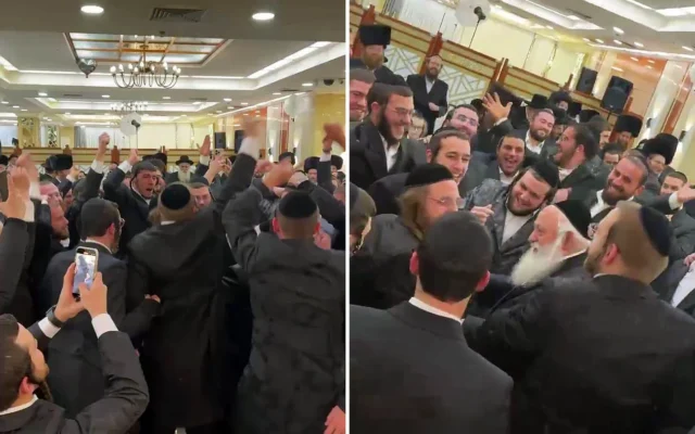 Le ministre du Logement Yitzchak Goldknopf danse avec d'autres invités au mariage de son neveu, le 23 mars 2025. (Capture d'écran : X ; utilisée conformément à l'article 27a de la loi sur le droit d'auteur) Le ministre du Logement Yitzchak Goldknopf danse avec d'autres invités au mariage de son neveu, le 23 mars 2025. (Capture d'écran : X ; utilisée conformément à l'article 27a de la loi sur le droit d'auteur)
