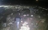 Des résidents d’implantations filmés par une caméra de sécurité en train de jeter des pierres sur des maisons du village palestinien de Susya, dans le sud de la Cisjordanie, le 2 mars 2025. (Crédit : Capture d'écran/X)