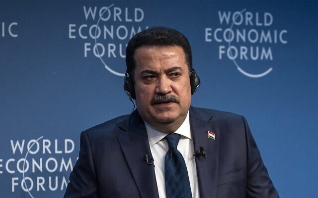 Le Premier ministre irakien Mohamed Chia al-Soudani assistant à une session lors de la réunion du Forum économique mondial (WEF), à Davos, en Suisse, le 18 janvier 2024. (Crédit : Fabrice Coffrini/AFP) Le Premier ministre irakien Mohamed Chia al-Soudani assistant à une session lors de la réunion du Forum économique mondial (WEF), à Davos, en Suisse, le 18 janvier 2024. (Crédit : Fabrice Coffrini/AFP)