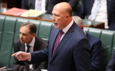 Le ministre australien de l'Intérieur, Peter Dutton, s'adresse au Parlement à Canberra, le 24 juillet 2019. (Crédit : Rod McGuirk/AP)