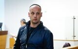 Eli Feldstein, l'un des suspects dans l'affaire du vol de documents classifiés, arrive au tribunal de Tel Aviv pour son audience, le 11 mars 2025. (Yehoshua Yosef/Flash90)