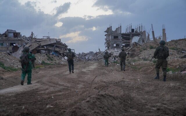 Des troupes de la division de Gaza opérant dans le sud de la bande de Gaza, sur une photo distribuée le 20 mars 2025. (Crédit : Armée israélienne) Des troupes de la division de Gaza opérant dans le sud de la bande de Gaza, sur une photo distribuée le 20 mars 2025. (Crédit : Armée israélienne)