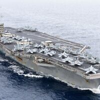 Le porte-avions de classe Nimitz USS Harry S. Truman (CVN 75) traversant le détroit de Gibraltar, le 25 novembre 2024. (Crédit : Michael Gomez/US Navy/AFP)