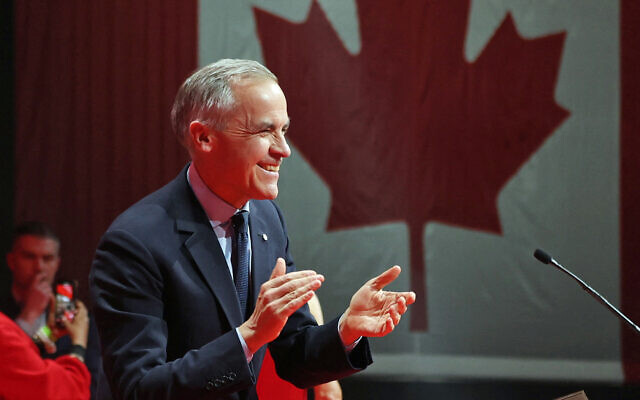 Le Premier ministre du Canada et chef du Parti libéral, Mark Carney, fête sa victoire à Ottawa, Ontario, le 29 avril 2025. (Crédit : Dave Chan / AFP)