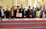 Mathias Ott (au centre), délégué interministériel à la lutte contre le racisme, l'antisémitisme et la haine anti-LBGT+, pose aux côtés d'acteurs locaux après la signature du plan départemental de lutte contre les discriminations, à la préfecture des Pyrénées-Orientales, à Perpignan, le 7 mai 2025. (Crédit : X / @Prefet66 / utilisée conformément à l'article 27a de la loi sur le droit d'auteur)