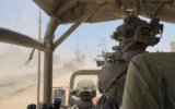 Des soldats de la 36e division de l'armée israélienne se dirigent vers Israël depuis l'hôpital européen de Khan Younès, le 8 juin 2025 (Crédit : Lazar Berman/The Times of Israel)