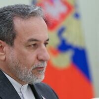 Le ministre iranien des Affaires étrangères Abbas Araghchi assistant à une réunion avec le président russe, au Kremlin, à Moscou, en Russie, le 23 juin 2025. (Crédit : Sergei Karpukhin/AFP)