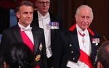 Le roi Charles III d'Angleterre (à droite) et le président français Emmanuel Macron assistant à un banquet officiel au château de Windsor, à l'ouest de Londres, le 8 juillet 2025, lors du premier jour d'une visite officielle de trois jours en Grande-Bretagne. (Crédit : Yui Mok/POOL/AFP)