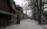L'entrée du mémorial et du musée d'Auschwitz-Birkenau, ancien camp de concentration et d'extermination nazi, à Oświęcim, en Pologne, le 26 janvier 2025. (Crédit : Czarek Sokolowski/AP)