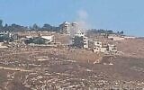De la fumée s'élève du site signalé d'une frappe aérienne israélienne sur le village de Wata al-Khiam, dans le sud du Liban, le 12 juillet 2025. (Capture d'écran)