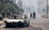 Des hommes armés appartenant à une tribu bédouine, à Soueïda, dans le sud de la Syrie, malgré l'annonce par le président intérimaire syrien d'un cessez-le-feu immédiat le 19 juillet 2025. (Crédit : Bakr Alkasem/AFP)
