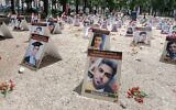 Des portraits d'Iraniens exécutés sont exposés dans un espace des Invalides à Paris, le 8 juillet 2025, dans le cadre d'une campagne menée par des militants français des droits de l'homme pour mettre fin aux exécutions dans la République islamique. (Crédit : Delphine TOUITOU / AFP)