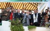 Ahmad Bahar, président du Conseil législatif de Gaza, s'exprimant au nom du Hamas ; Zaher Birawi (2ᵉ à partir de la gauche), chef de la section britannique du Hamas au sein de la PCPA. (Crédit : Ministère des Affaires étrangères)
