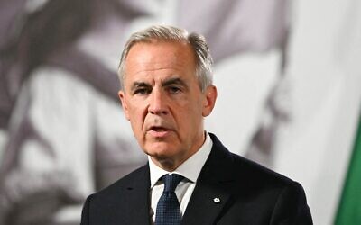 Le Premier ministre canadien Mark Carney s'exprimant lors d'une conférence de presse, au Palais national de Mexico, le 18 septembre 2025. (Crédit : Yuri Cortez/AFP)