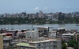 Vue générale de la lagune Ébrié qui traverse les quartiers de Marcory et Cocody à Abidjan, le 10 mai 2023. (Crédit : Issouf Sanogo / AFP)