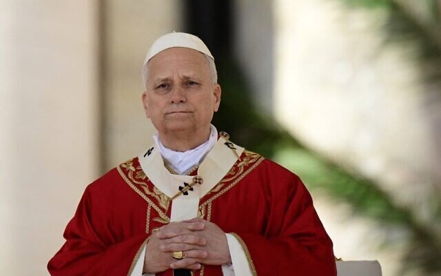 Le pape Léon XIV célèbre une messe pour le dimanche des Rameaux sur la place Saint-Pierre au Vatican, le 29 mars 2026. (Crédit : Tiziana FABI / AFP)