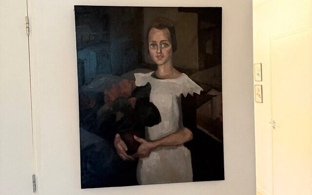 Le tableau « Portrait d'une jeune fille » de l'artiste néerlandais Toon Kelder, une œuvre d'art volée par les nazis à la célèbre collection Goudstikker et découverte au domicile des descendants d'un tristement célèbre collaborateur néerlandais de la SS, sur cette photo de presse prise dans un lieu tenu secret et diffusée par Arthur Brand le 11 mai 2026. (Crédit : Arthur Brand/AFP) Le tableau « Portrait d'une jeune fille » de l'artiste néerlandais Toon Kelder, une œuvre d'art volée par les nazis à la célèbre collection Goudstikker et découverte au domicile des descendants d'un tristement célèbre collaborateur néerlandais de la SS, sur cette photo de presse prise dans un lieu tenu secret et diffusée par Arthur Brand le 11 mai 2026. (Crédit : Arthur Brand/AFP)