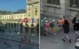 Captures d'écran d'une vidéo montrant le suspect présumé d'une attaque à l'arme blanche en train de courir dans une rue de Winterthur, en Suisse, le 28 mai 2026. (Capture d'écran/Réseaux sociaux)
