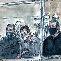 Mohamed Bakkali (à gauche), ici en juin 2022 au côté d'Oussama Atar (au centre) et Salah Abdeslam (à droite) dans le box des accusés du procès des attentats du 13-Novembre. Benoît Peyrucq/AFP