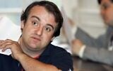 Vincent Reynouard, poursuivi pour avoir nié des crimes contre l'humanité, pose lors de sa comparution devant le tribunal correctionnel de Saverne, le 27 septembre 2007. (Crédit : Frederick FLORIN / AFP)