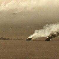 Cette photo diffusée le 15 septembre 2026 par l'Ansarullah Media Center des Houthis montrerait, selon certaines sources, des véhicules militaires en feu qu'ils auraient pris pour cible dans la province d'al-Jawf, en Arabie saoudite. (Crédit : ANSARULLAH MEDIA CENTER/AFP)