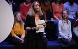 L’auteure belge Geneviève Damas prononce un discours lors de la rencontre du pape François avec des étudiants, à Ottignies-Louvain-la-Neuve, en Belgique, le samedi 28 septembre 2024. (Crédit : Andrew Medichini/AP)