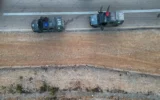 Des véhicules de la police des frontières près de la barrière de sécurité, à proximité du village palestinien d’Al-Jib, près de Jérusalem, le 9 septembre 2026. (Crédit : Chaim Goldberg/Flash 90)