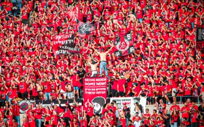 Extrait de la page Facebook officielle du club de football Hapoel Jérusalem, qui avait annoncé; le 15 mai 2025; qu’il célébrerait le centenaire de sa fondation avec un nouveau logo représentant Hersh Goldberg-Polin, un supporter et otage du Hamas assassiné pendant sa captivité. (Autorisation) Extrait de la page Facebook officielle du club de football Hapoel Jérusalem, qui avait annoncé; le 15 mai 2025; qu’il célébrerait le centenaire de sa fondation avec un nouveau logo représentant Hersh Goldberg-Polin, un supporter et otage du Hamas assassiné pendant sa captivité. (Autorisation)