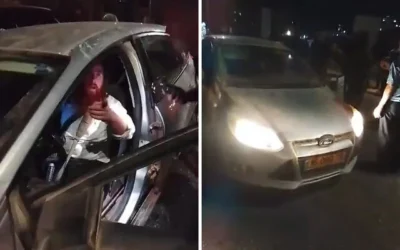 Un résident d'implantation armé, réserviste hors service, interpellé par la police de l'Autorité palestinienne près du village de Beitunia, en Cisjordanie, le 23 août. (Crédit : Réseaux sociaux ; utilisées conformément à l'article 27a de la loi sur le droit d'auteur)