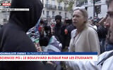 Alexandra Sojfer, militante pro-israélienne, prise violemment à partie par un émeutier anti-Israël qui la traite de "nazie", le 8 octobre 2026 à Paris. (Crédit : capture d'écran Cnews)