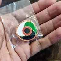 Un badge « Coquelicot palestinien » vendu en Grande-Bretagne à l'approche du Jour du Souvenir, en octobre 2026. (Site Internet Palestine Poppy)