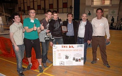 The winning team, along with representatives of World ORT and Misgav High School, celebrate their victory (photo credit: Courtesy)