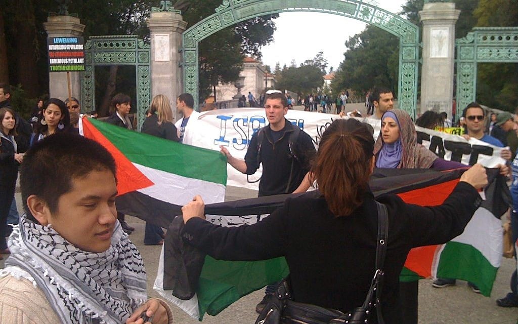 Illustrative photo of pro-Palestinian demonstrators facing pro-Israel demonstrators at an Israel Apartheid Week event at the University of California, Berkeley, in February 2012. (CC-BY/James Buck/Flickr) Illustrative photo of pro-Palestinian demonstrators facing pro-Israel demonstrators at an Israel Apartheid Week event at the University of California, Berkeley, in February 2012. (CC-BY/James Buck/Flickr)