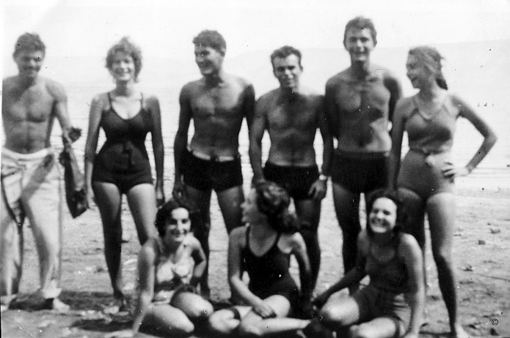 "On the Kinneret beach with girls from Kibbutz Afikim." From the collection of Ferol and Rivkaleh Atzmon. (Courtesy: Bitmuna)