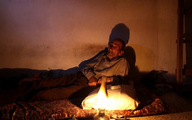 A house in Gaza lit by a gas lamp during an electric shortage (photo credit: Wissam Nassar/Flash90)