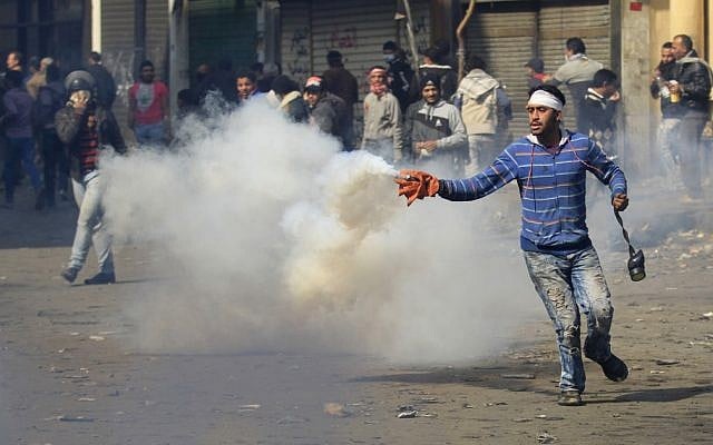 Egyptian protester in Cairo on Saturday (photo credit: AP/Khalil Hamra)