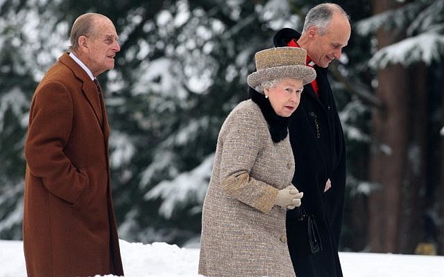 The queen braved the cold and snow to attend church Sunday on the eve of her Diamond Jubilee anniversary. The 85-year-old monarch marks 60 years on the throne on Monday.  (photo credit: AP Photo/PA, Chris Radburn)